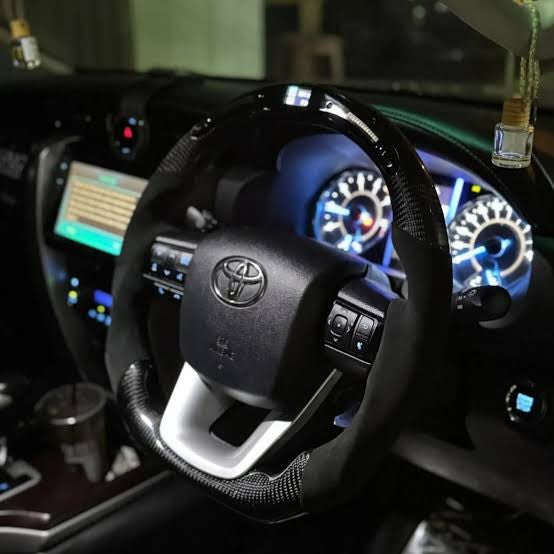 Toyota Fortuner / Crysta / Hilux Real Carbon Fibre steering wheel with LED alcantara